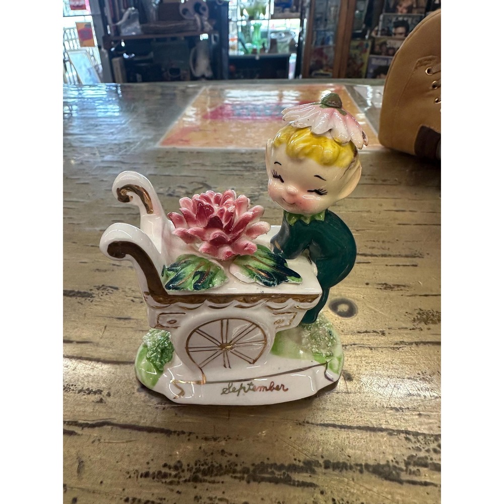 Vintage Norcrest September Flower of the Month Pixie on flower cart